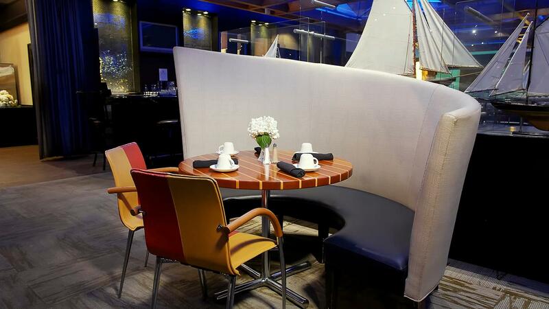 Restaurant booth, table and two chairs.